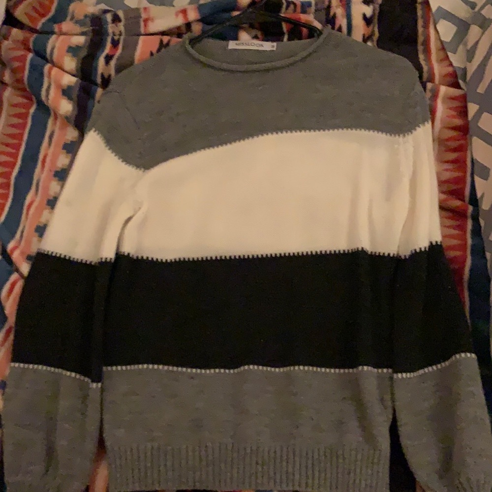 I’m sharing this sweater that is very soft and warm it looks good under vest